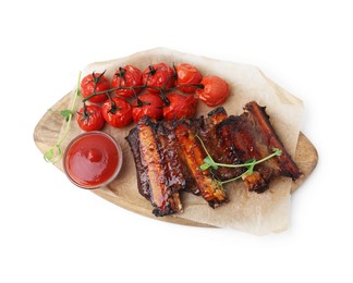 Photo of Roasted beef ribs with microgreens, tomatoes and sauce isolated on white, top view