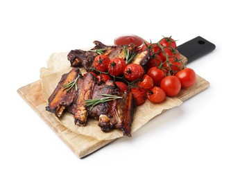 Photo of Roasted beef ribs with rosemary, tomatoes and sauce isolated on white