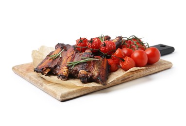 Photo of Roasted beef ribs with rosemary and tomatoes isolated on white