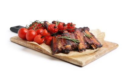 Photo of Roasted beef ribs with rosemary and tomatoes isolated on white