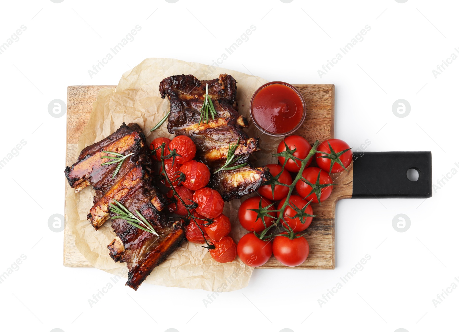 Roasted beef ribs with rosemary, tomatoes and sauce isolated on white, top view Photo of Roasted beef ribs with rosemary, tomatoes and sauce isolated on white, top view