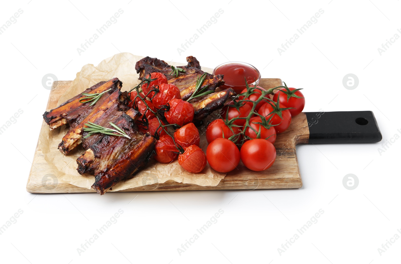 Roasted beef ribs with rosemary, tomatoes and sauce isolated on white Photo of Roasted beef ribs with rosemary, tomatoes and sauce isolated on white