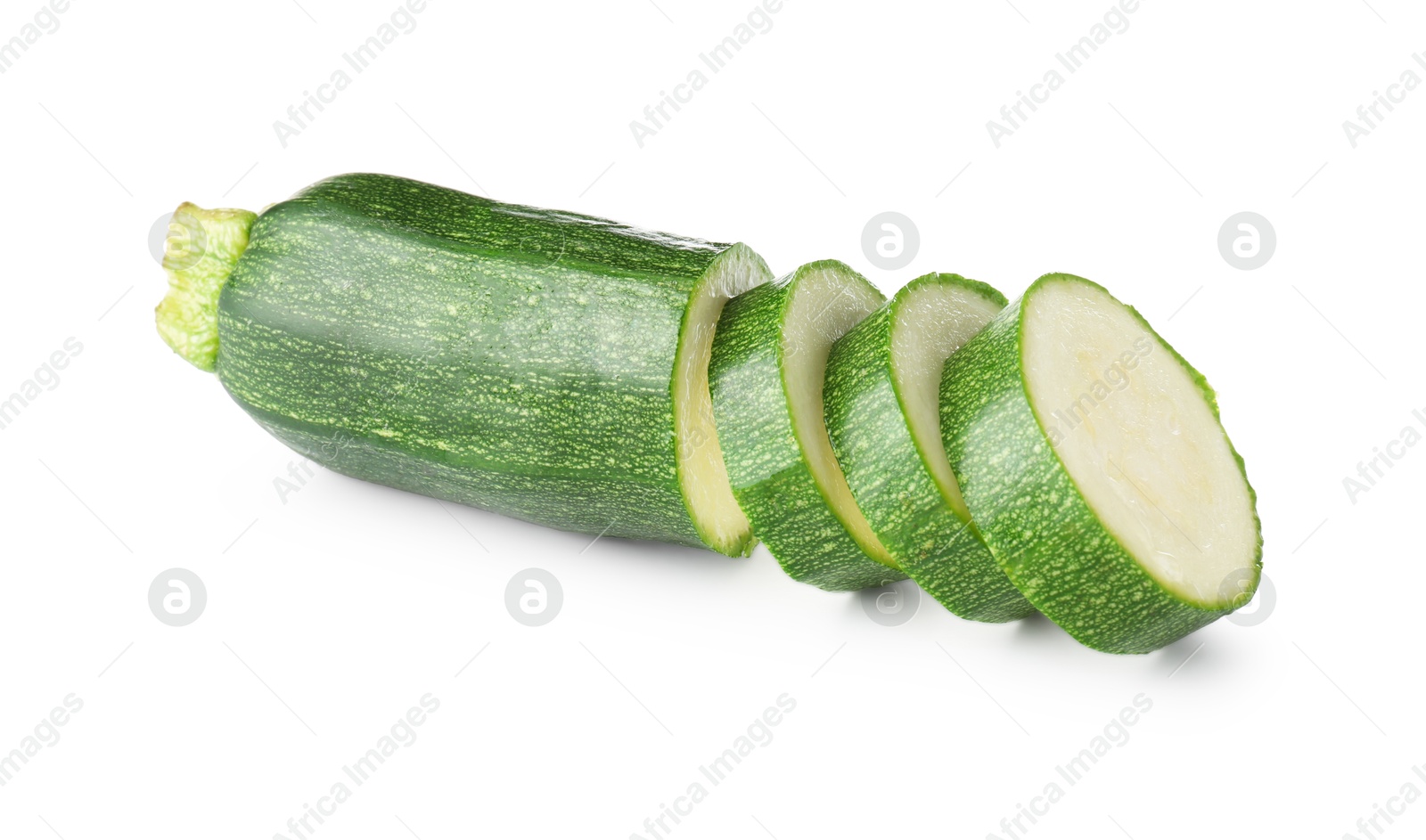 Pieces of fresh zucchini isolated on white Photo of Pieces of fresh zucchini isolated on white