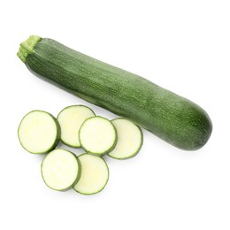 Photo of Whole and cut fresh zucchinis isolated on white, top view