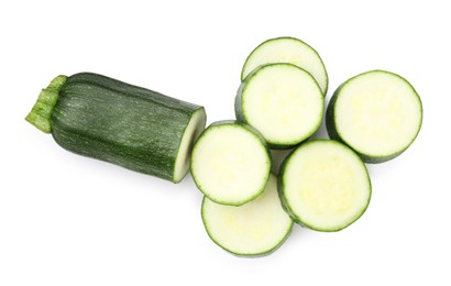 Photo of Pieces of fresh zucchini isolated on white, top view
