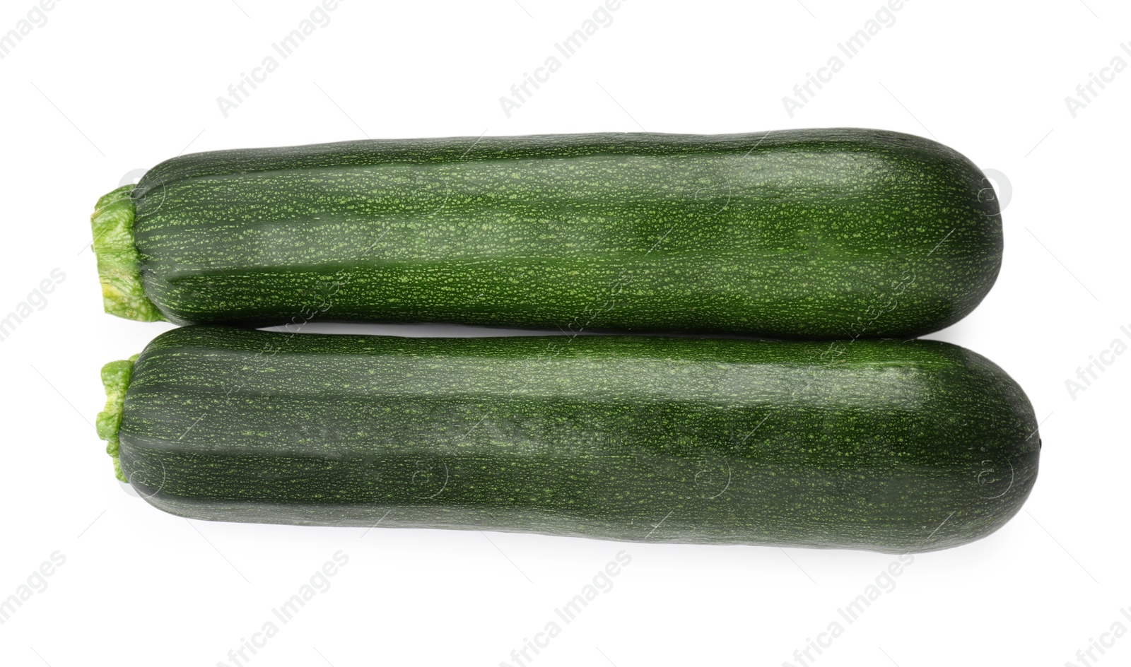 Fresh ripe zucchinis isolated on white, top view Photo of Fresh ripe zucchinis isolated on white, top view