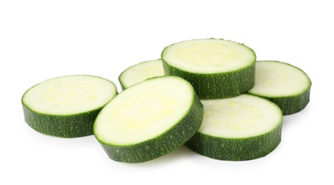 Photo of Pieces of fresh zucchini isolated on white