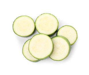 Photo of Pieces of fresh zucchini isolated on white, top view