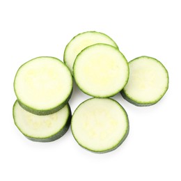 Photo of Pieces of fresh zucchini isolated on white, top view