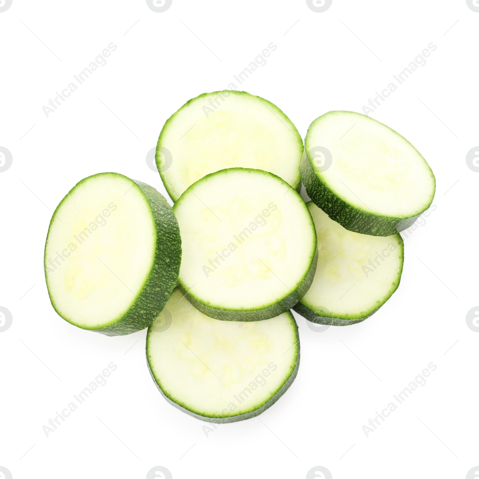 Pieces of fresh zucchini isolated on white, top view Photo of Pieces of fresh zucchini isolated on white, top view