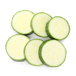 Photo of Pieces of fresh zucchini isolated on white, top view