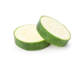 Photo of Pieces of fresh zucchini isolated on white