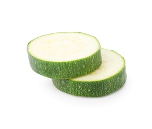 Photo of Pieces of fresh zucchini isolated on white