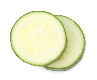 Photo of Pieces of fresh zucchini isolated on white, top view