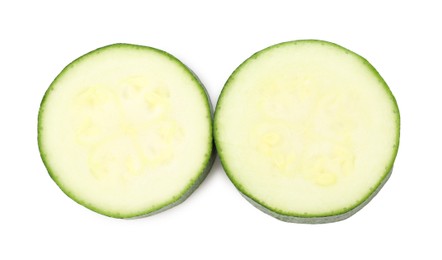 Photo of Pieces of fresh zucchini isolated on white, top view