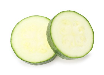 Photo of Pieces of fresh zucchini isolated on white, top view