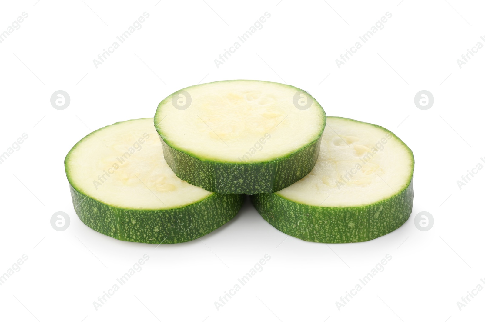 Photo of Pieces of fresh zucchini isolated on white