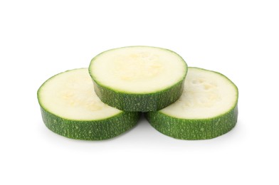 Photo of Pieces of fresh zucchini isolated on white