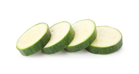 Photo of Pieces of fresh zucchini isolated on white