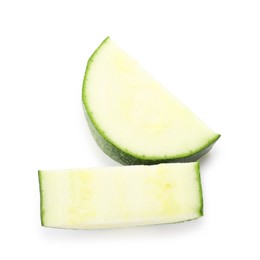 Photo of Pieces of fresh zucchini isolated on white, top view