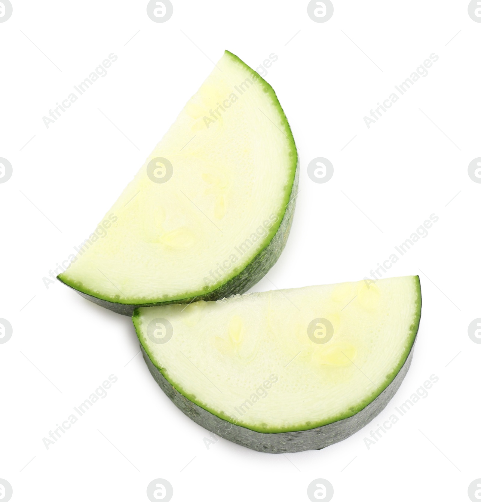 Pieces of fresh zucchini isolated on white, top view Photo of Pieces of fresh zucchini isolated on white, top view