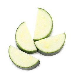 Photo of Pieces of fresh zucchini isolated on white, top view