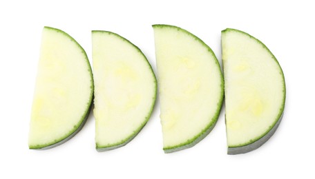 Photo of Pieces of fresh zucchini isolated on white, top view