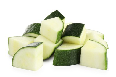 Photo of Pieces of fresh zucchini isolated on white