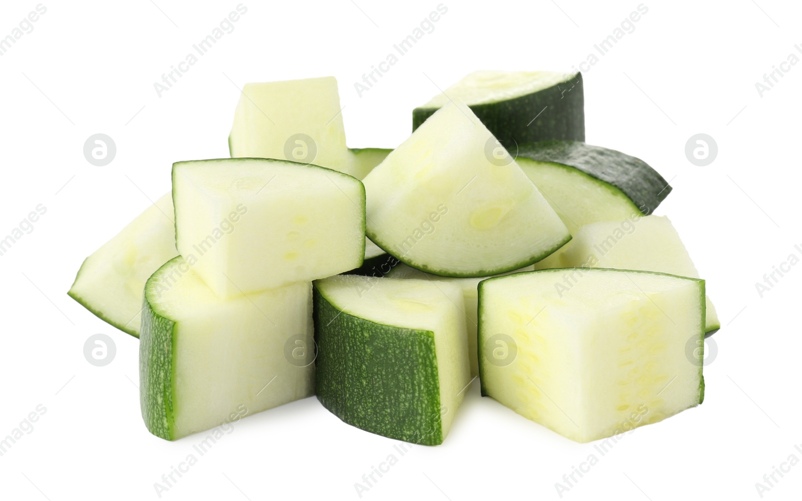 Pieces of fresh zucchini isolated on white Photo of Pieces of fresh zucchini isolated on white