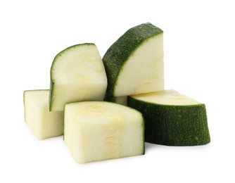 Photo of Pieces of fresh zucchini isolated on white