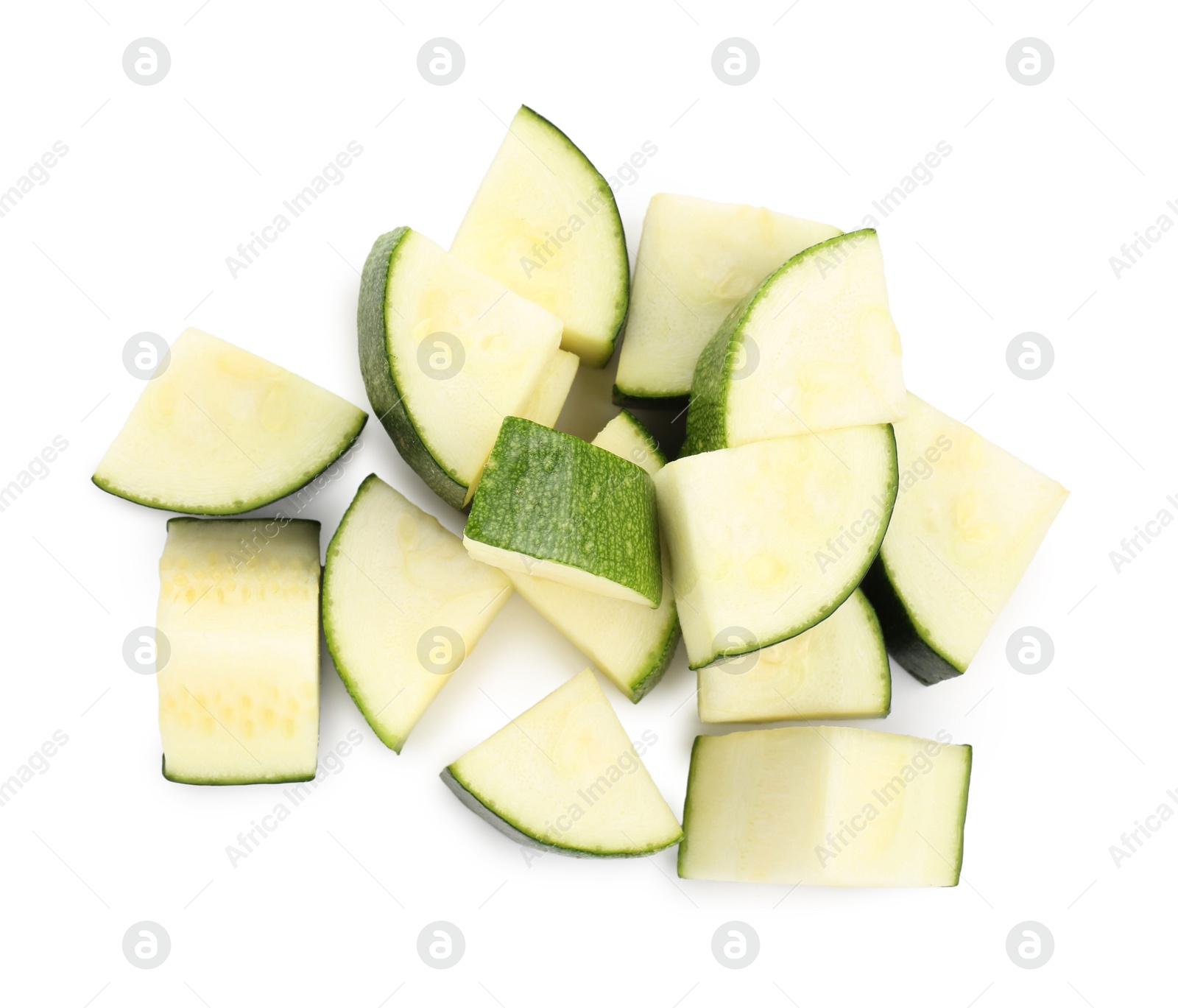 Pieces of fresh zucchini isolated on white, top view Photo of Pieces of fresh zucchini isolated on white, top view