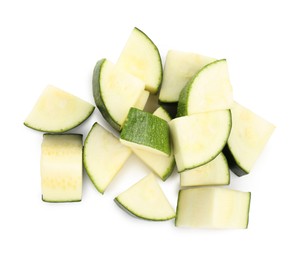 Photo of Pieces of fresh zucchini isolated on white, top view