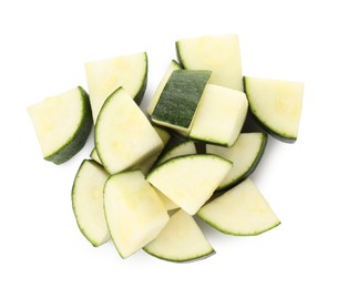 Photo of Pieces of fresh zucchini isolated on white, top view