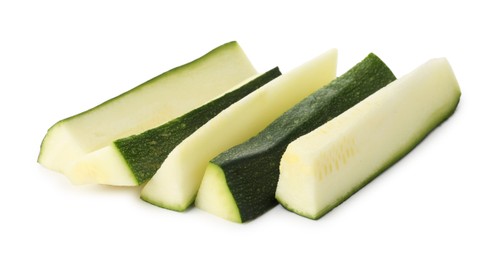 Photo of Pieces of fresh zucchini isolated on white