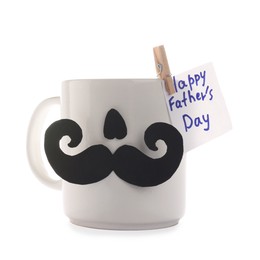 Photo of Happy Father's Day card and cup with paper face isolated on white