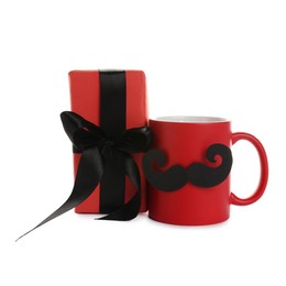 Photo of Happy Father's Day. Cup with mustache and gift box isolated on white