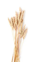 Photo of Many dried wheat ears isolated on white, top view