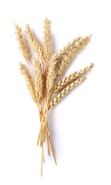 Photo of Many dried wheat ears isolated on white, top view