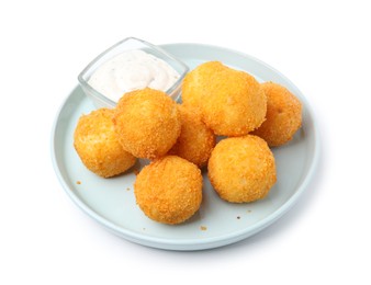 Photo of Delicious fried croquette balls and sauce isolated on white