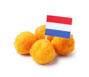 Photo of Delicious fried croquette balls and flag of Netherlands isolated on white