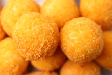 Photo of Delicious fried croquette balls as background, top view