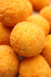Photo of Delicious fried croquette balls as background, closeup