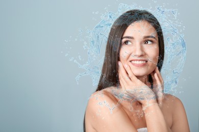 Image of Woman with smooth skin and water splashes on grey background. Space for text