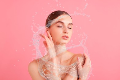 Image of Young woman with smooth skin and water splashes on pink background