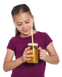 Photo of Little girl with juice and drinking straw on white background