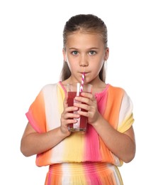 Photo of Little girl drinking juice through straw on white background