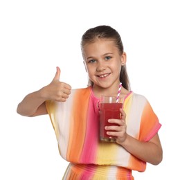 Photo of Little girl with juice and drinking straw showing thumbs up on white background