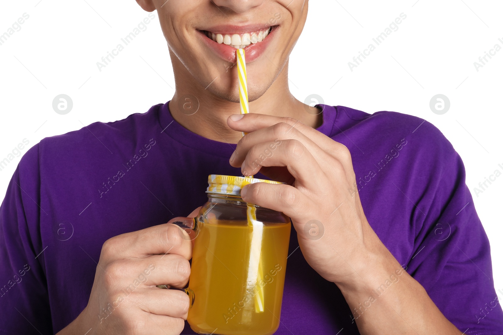 Photo of Man drinking juice through straw on white background, closeup