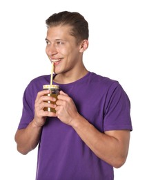 Photo of Man drinking juice through straw on white background