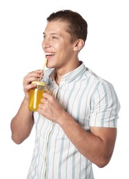 Photo of Man drinking juice through straw on white background